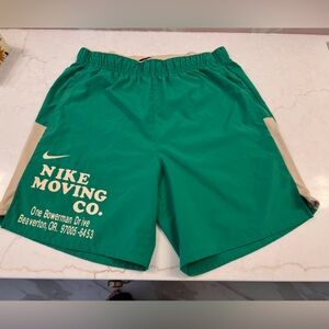 Nike Men's Green Athletic Shorts with Beige Accents